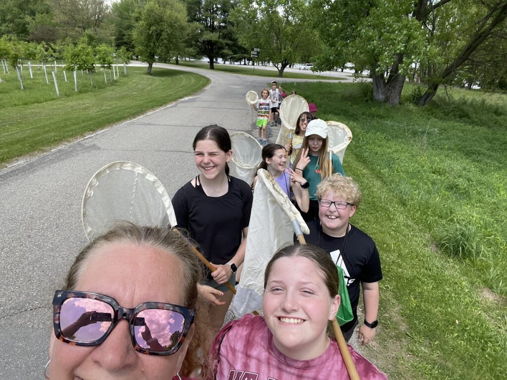 Website school of the wild teacher and kids with nets